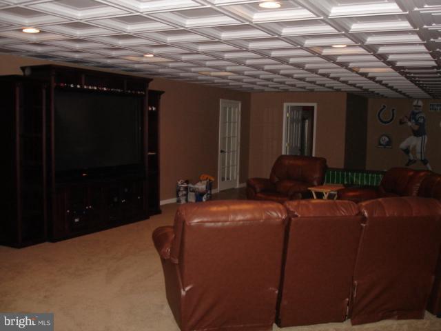 6554 Pebble Brooke Road Baltimore, MD 21209 - Photo 16 of 17 a living room with furniture and a air conditioner vent