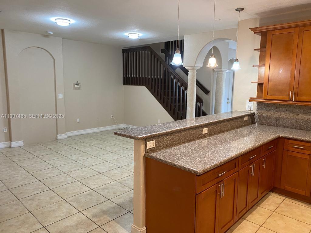 13426 Southwest 177th Terrace Miami, FL 33177 - Photo 11 of 36 a bathroom with a sink a vanity and a mirror