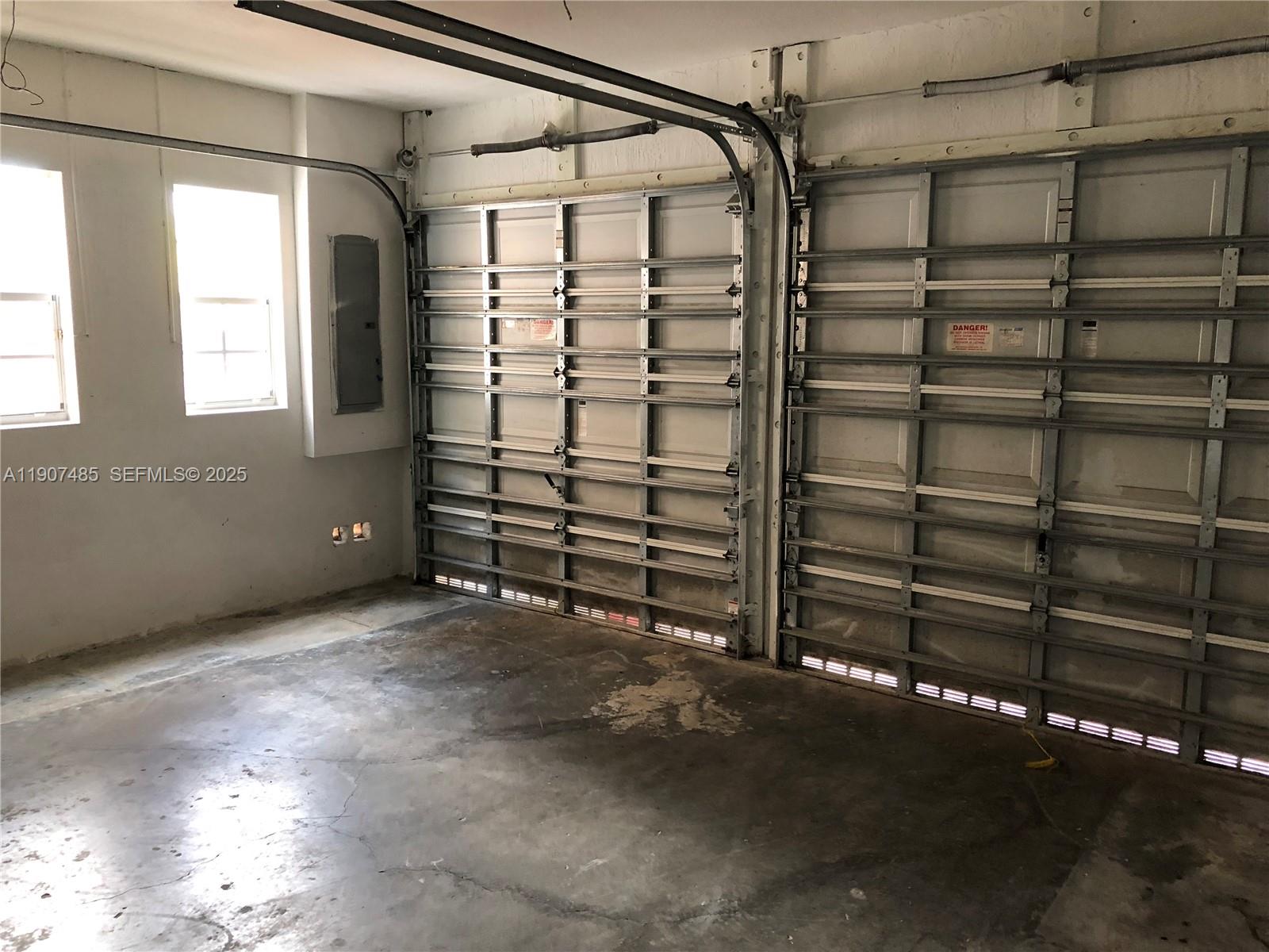 13426 Southwest 177th Terrace Miami, FL 33177 - Photo 16 of 36 a view of an empty room and a window