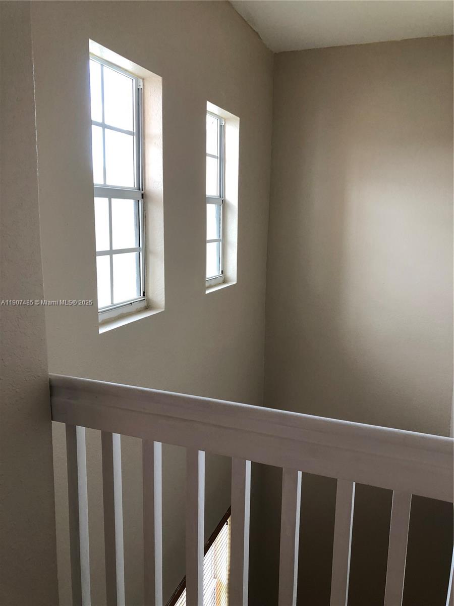 13426 Southwest 177th Terrace Miami, FL 33177 - Photo 32 of 36 a view of wooden floor and window