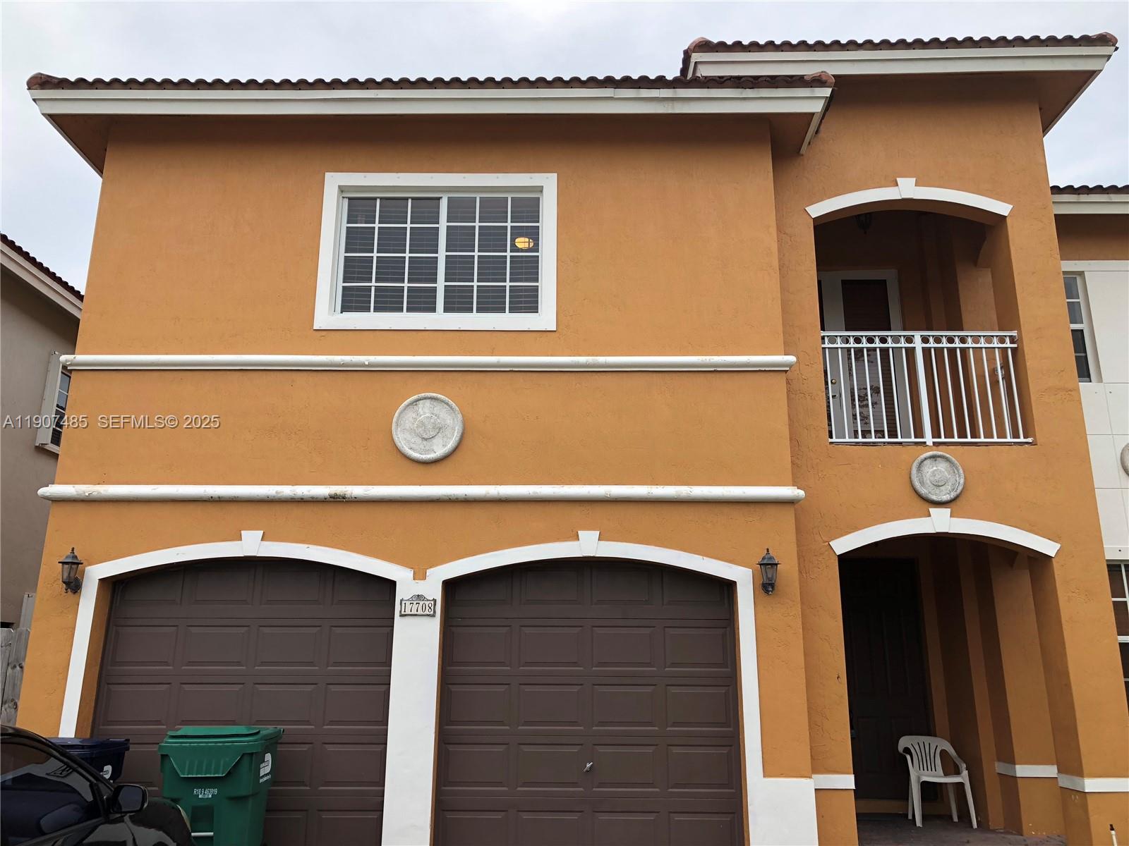 13426 Southwest 177th Terrace Miami, FL 33177 - Photo 4 of 36 a view of a house with a door