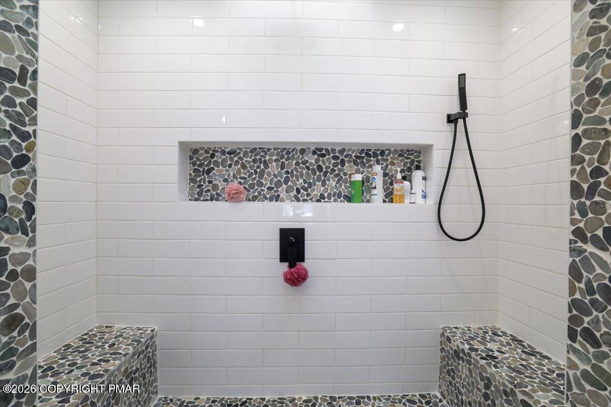 5873 Decker Road Bushkill, PA 18324 - Photo 8 of 57 a bathroom with a shower