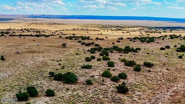 a view of a pathway with a lake view