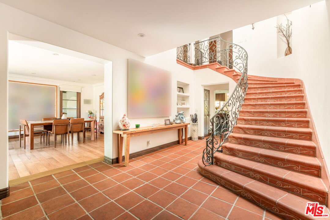 604 Alta Drive Beverly Hills, CA 90210 - Photo 2 of 21 a living room with furniture and wooden floor