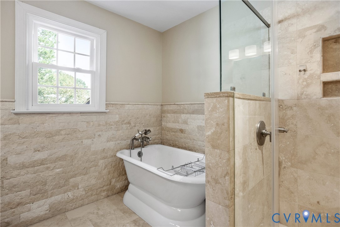 407 Lynchell Place Henrico, VA 23238 - Photo 2 of 50 a white bath tub sitting next to a shower