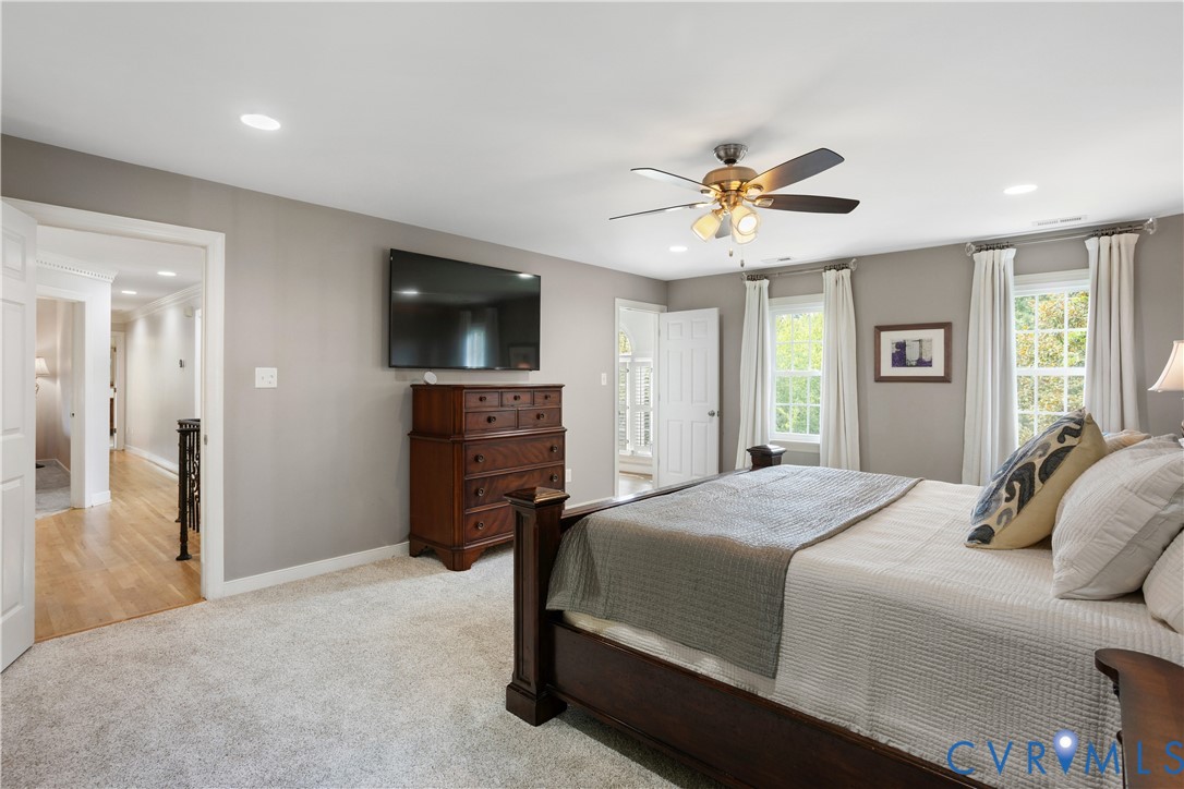 407 Lynchell Place Henrico, VA 23238 - Photo 29 of 50 a bedroom with a bed and a flat screen tv