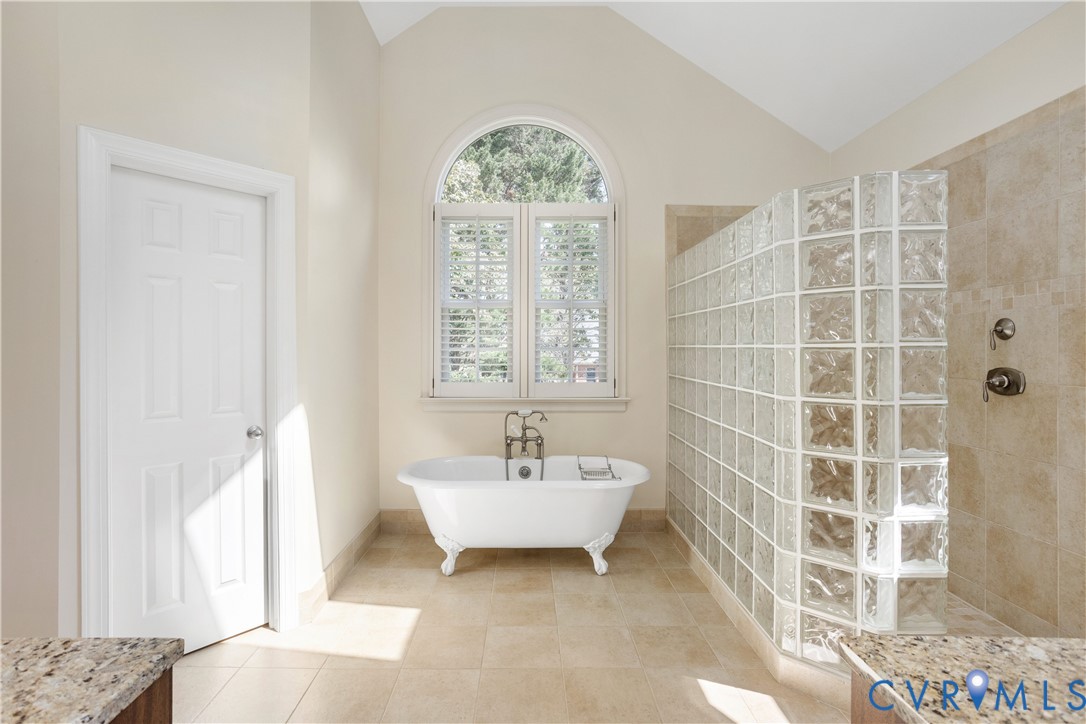 407 Lynchell Place Henrico, VA 23238 - Photo 30 of 50 a spacious bathroom with a bathtub and a window