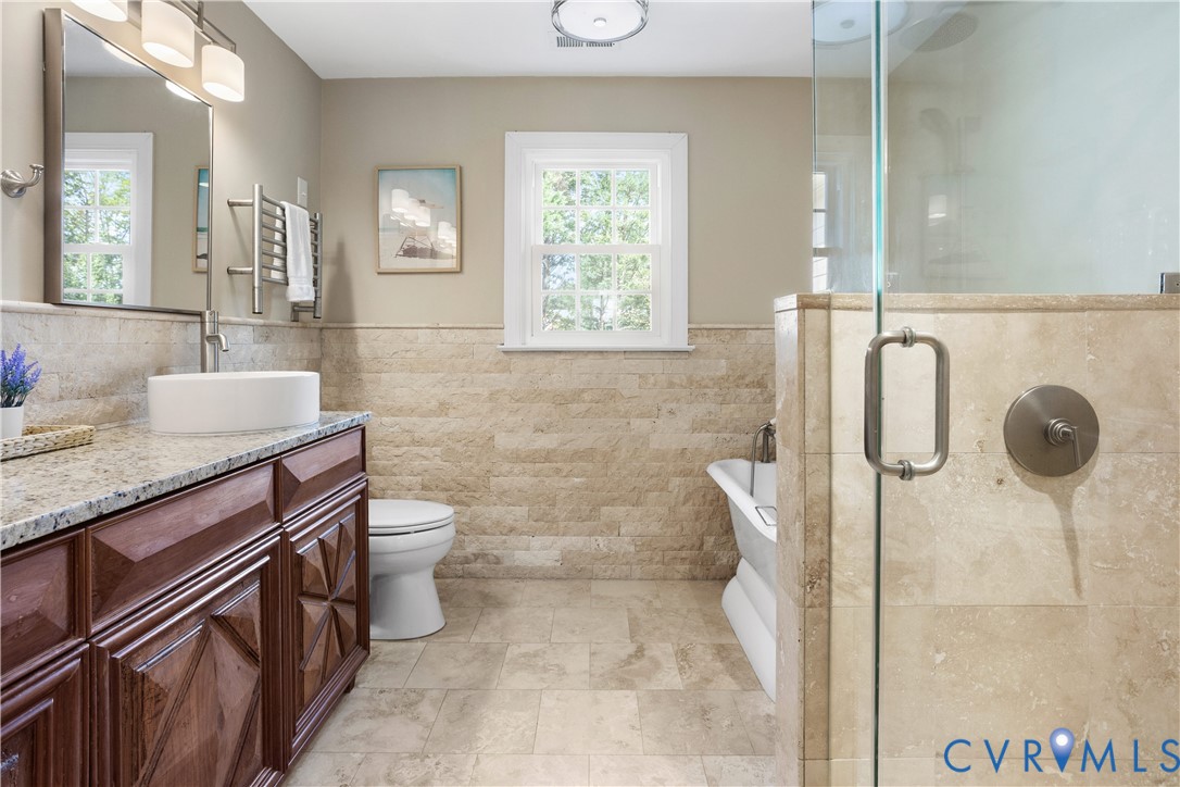 407 Lynchell Place Henrico, VA 23238 - Photo 36 of 50 a bathroom with a granite countertop sink a toilet and a mirror