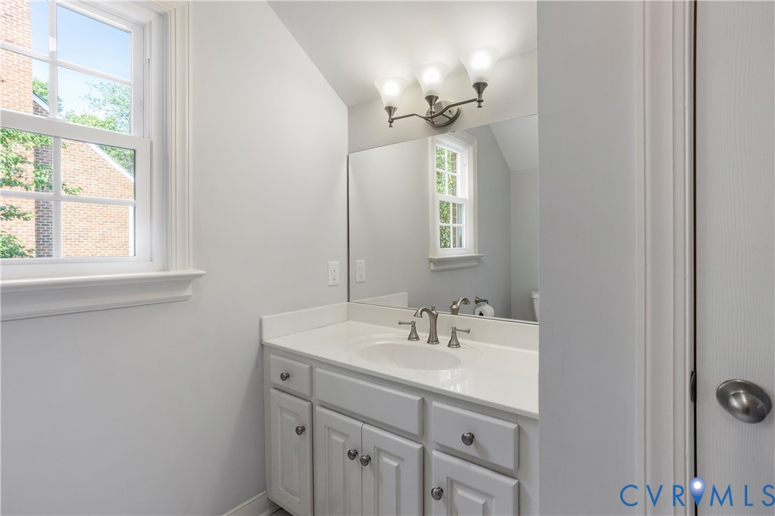 407 Lynchell Place Henrico, VA 23238 - Photo 45 of 50 a bathroom with a sink and a mirror