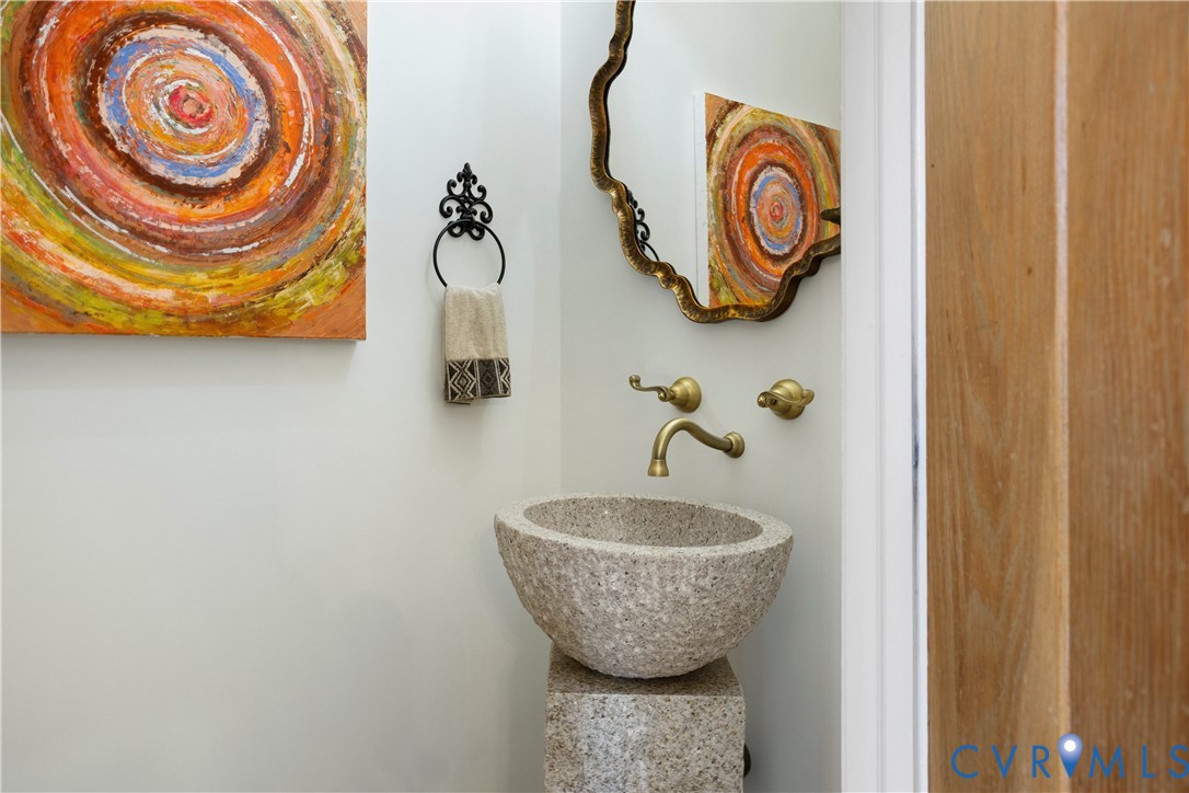 407 Lynchell Place Henrico, VA 23238 - Photo 8 of 50 a bathroom with a granite countertop sink and a mirror