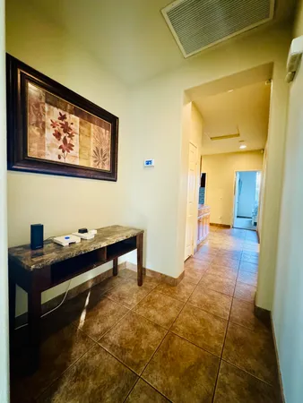 a view of a workspace with furniture