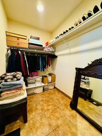 a kitchen with stainless steel appliances a sink and cabinets