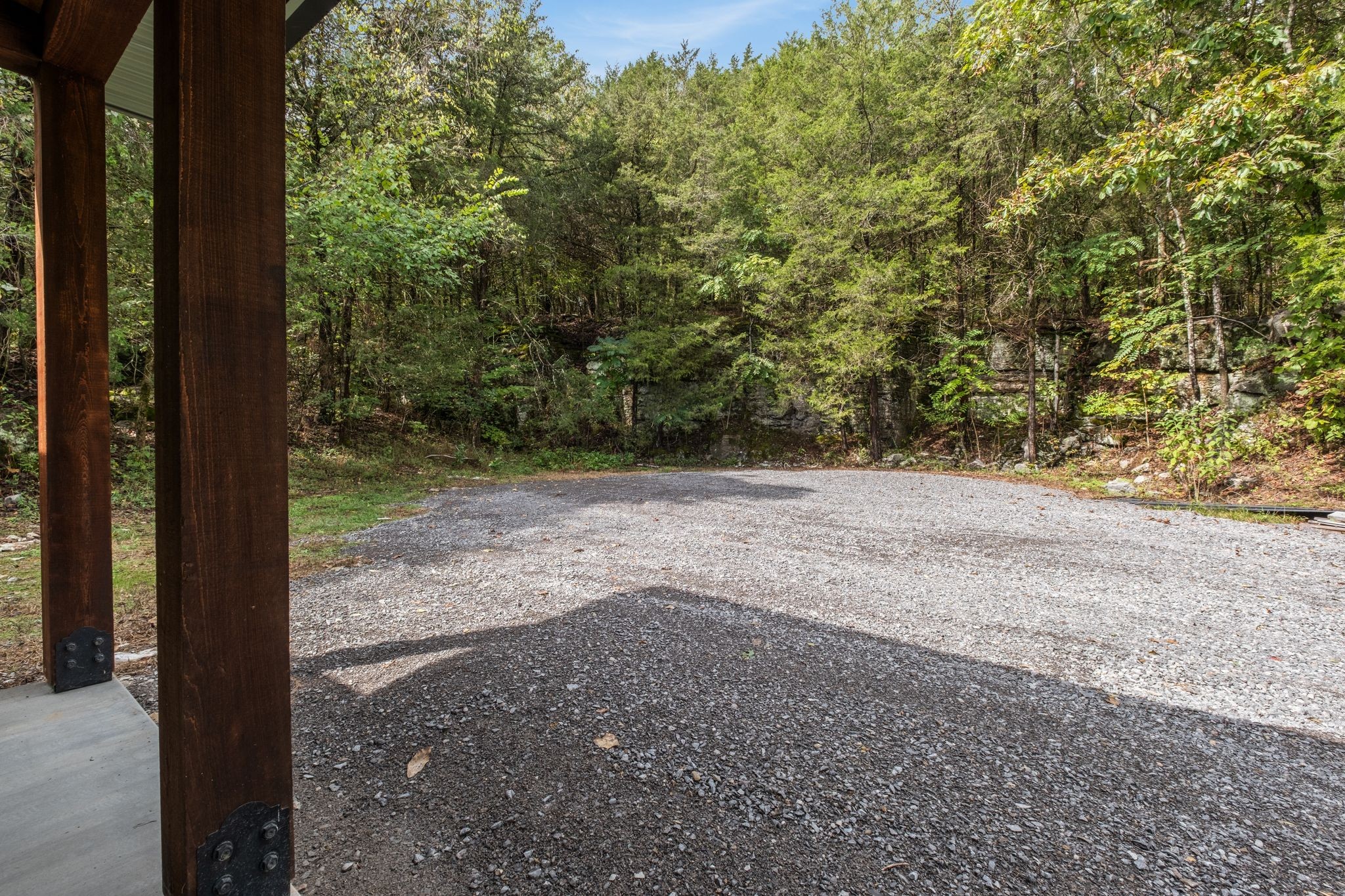 672 Sullivan Bend Road Elmwood, TN 38560 - Photo 11 of 39 a view of a yard with trees in the background