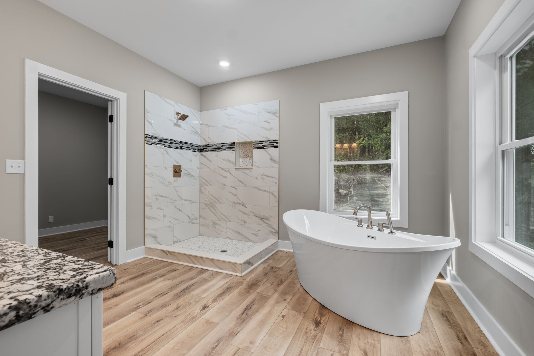 672 Sullivan Bend Road Elmwood, TN 38560 - Photo 22 of 39 a bathroom with a bathtub and shower