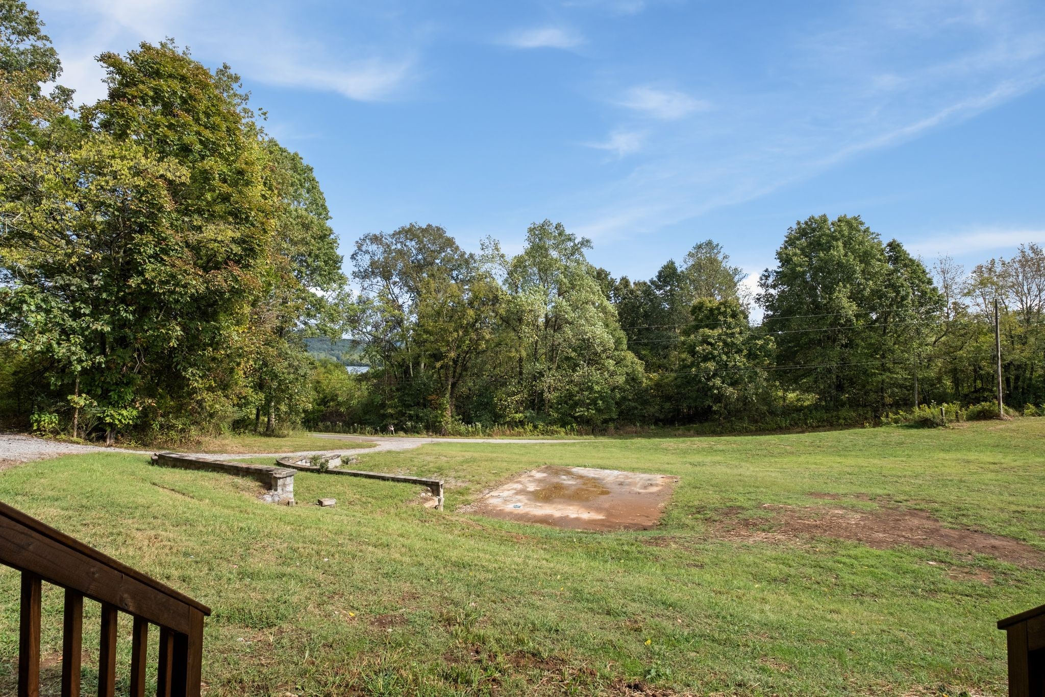672 Sullivan Bend Road Elmwood, TN 38560 - Photo 36 of 39 a view of a field with trees in the background