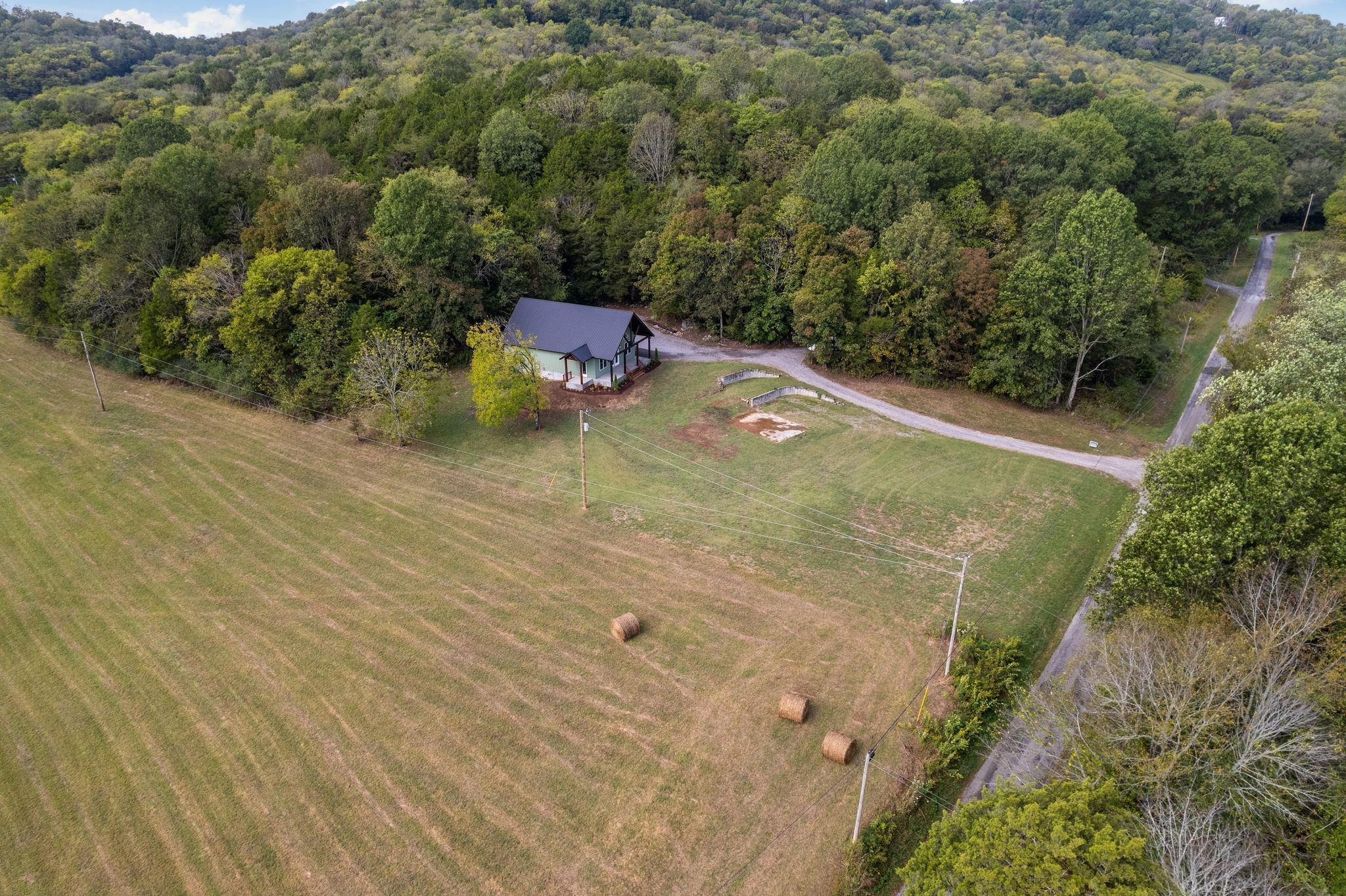 672 Sullivan Bend Road Elmwood, TN 38560 - Photo 38 of 39 an aerial view of a house with a yard
