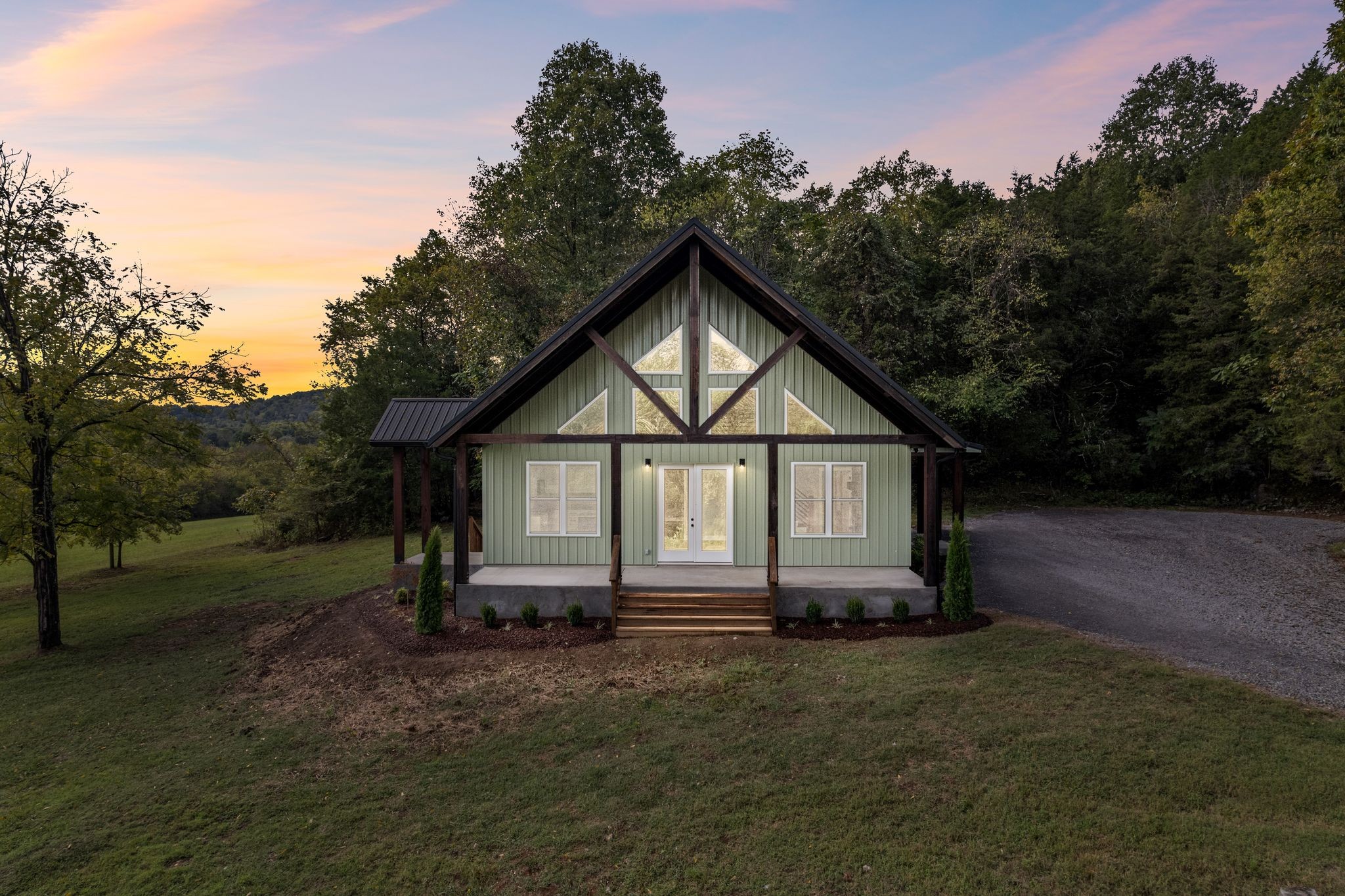 672 Sullivan Bend Road Elmwood, TN 38560 - Photo 4 of 39 a view of backyard of house with green space