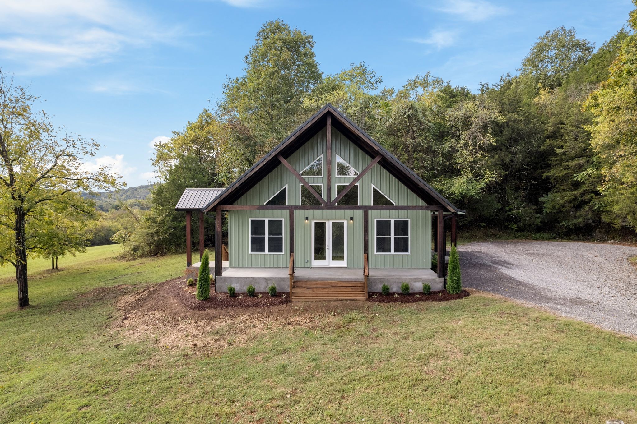 672 Sullivan Bend Road Elmwood, TN 38560 - Photo 7 of 39 a view of a house with a yard