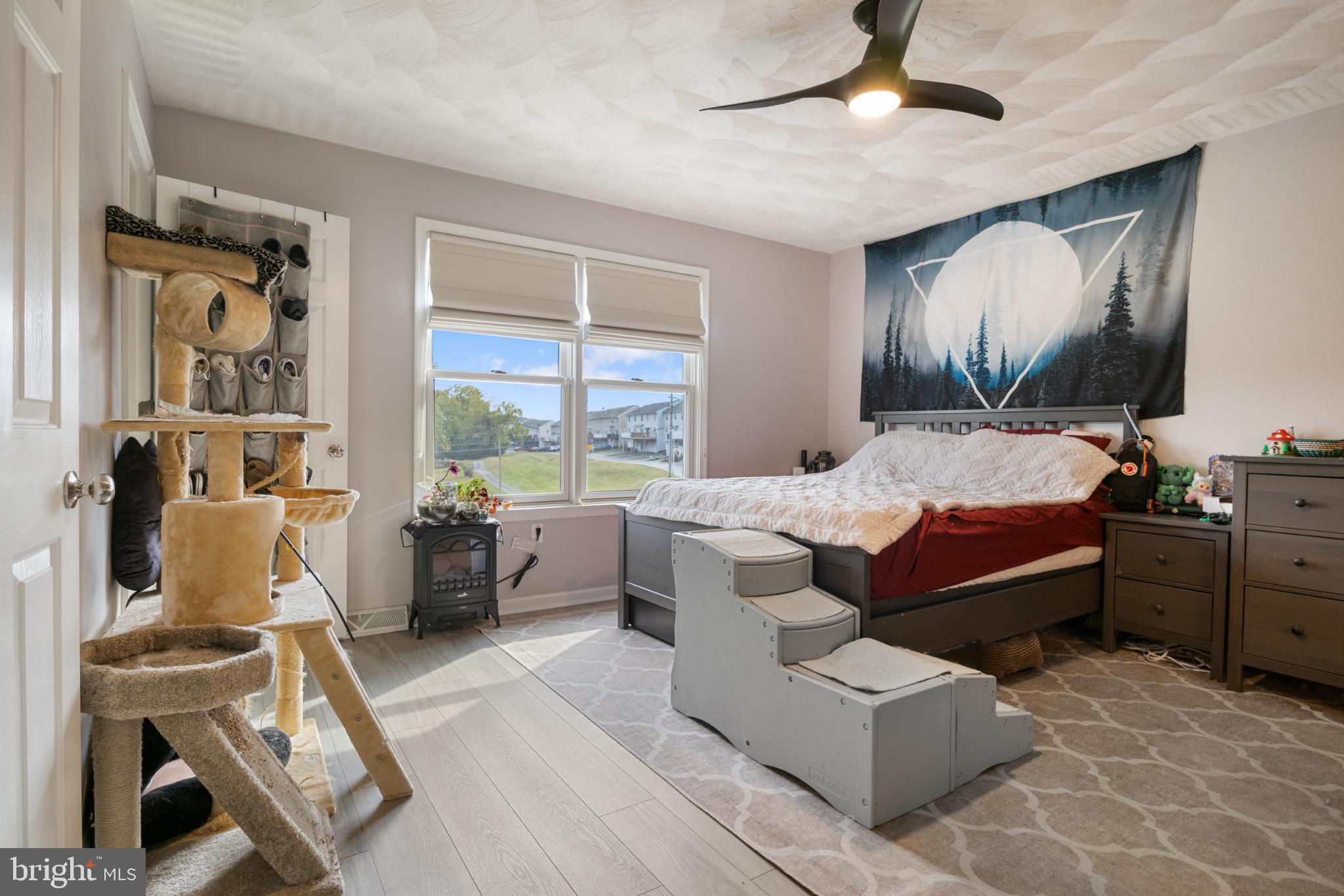840 Country Club Road Red Lion, PA 17356 - Photo 19 of 39 Cozy bedroom with serene views and style.