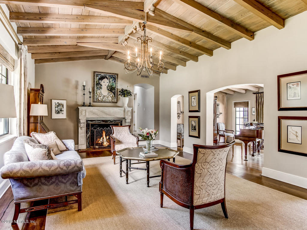 1036 Elder Lane Jacksonville, FL 32207 - Photo 15 of 79 a living room with furniture and a fireplace