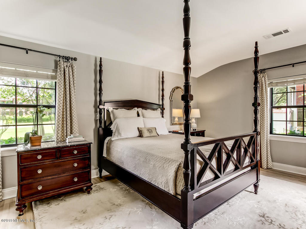 1036 Elder Lane Jacksonville, FL 32207 - Photo 43 of 79 a bedroom with a bed and a window