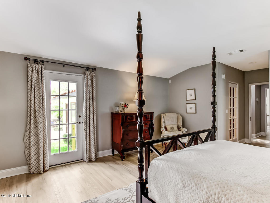 1036 Elder Lane Jacksonville, FL 32207 - Photo 44 of 79 a bedroom with furniture and a window