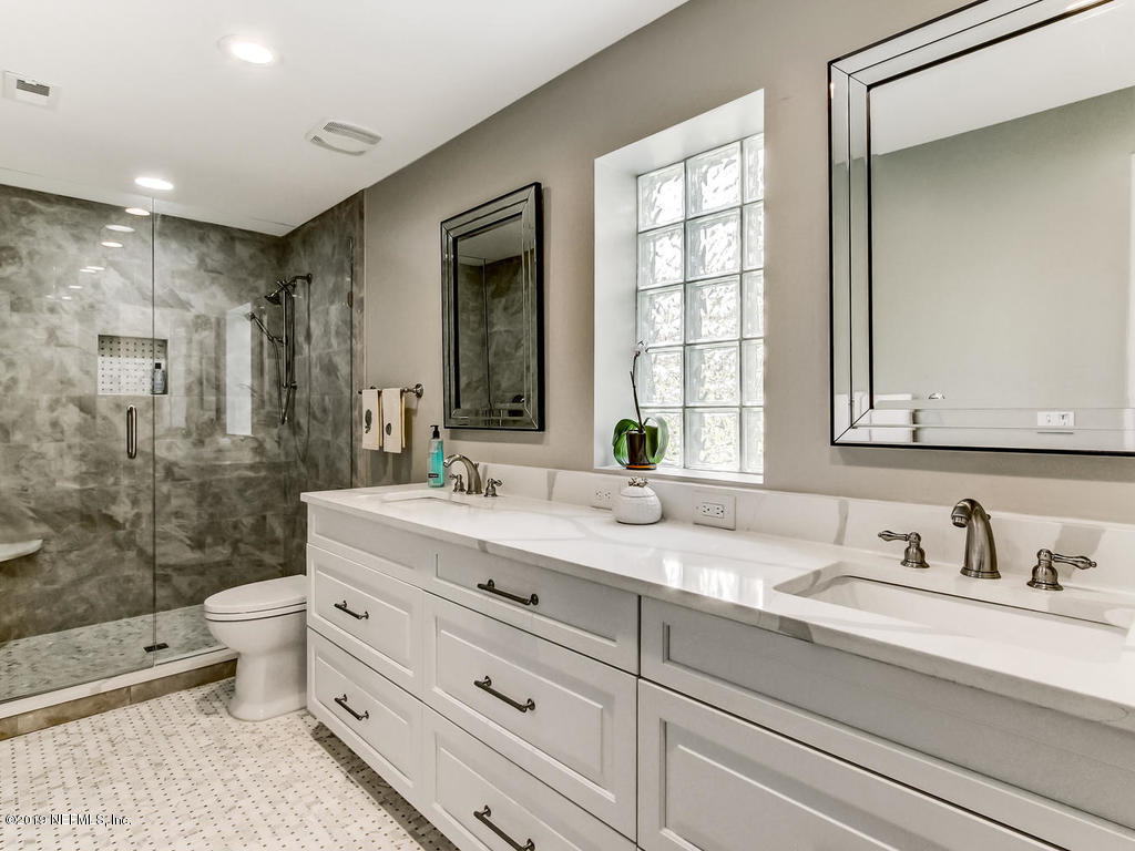 1036 Elder Lane Jacksonville, FL 32207 - Photo 49 of 79 Marbled, designer bath with glassblock