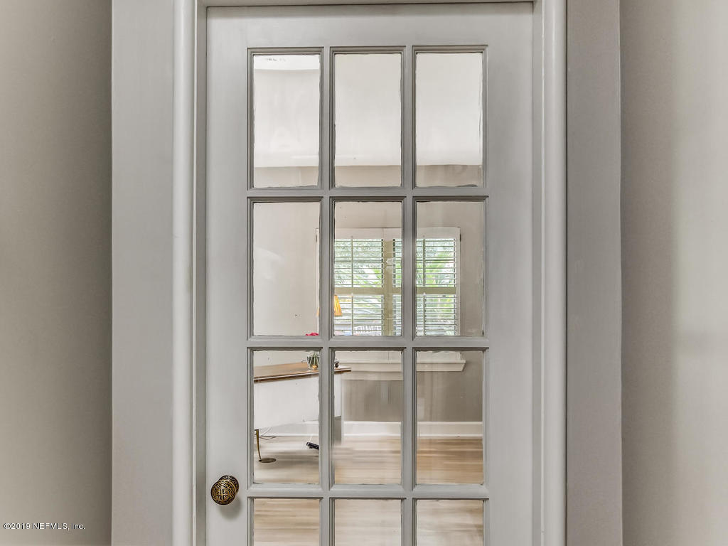 1036 Elder Lane Jacksonville, FL 32207 - Photo 52 of 79 a view of a glass door with a glass door
