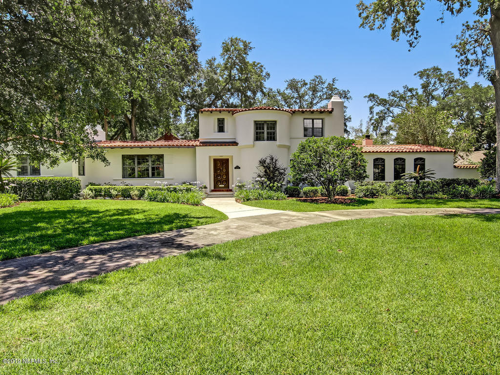 1036 Elder Lane Jacksonville, FL 32207 - Photo 6 of 79 a front view of a house with a yard