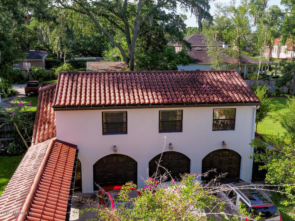 1036 Elder Lane Jacksonville, FL 32207 - Photo 65 of 79 a front view of a house with garden