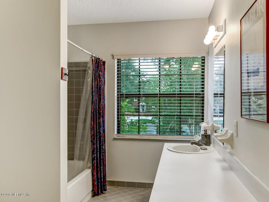 1036 Elder Lane Jacksonville, FL 32207 - Photo 69 of 79 Bathroom with large vanity/storage