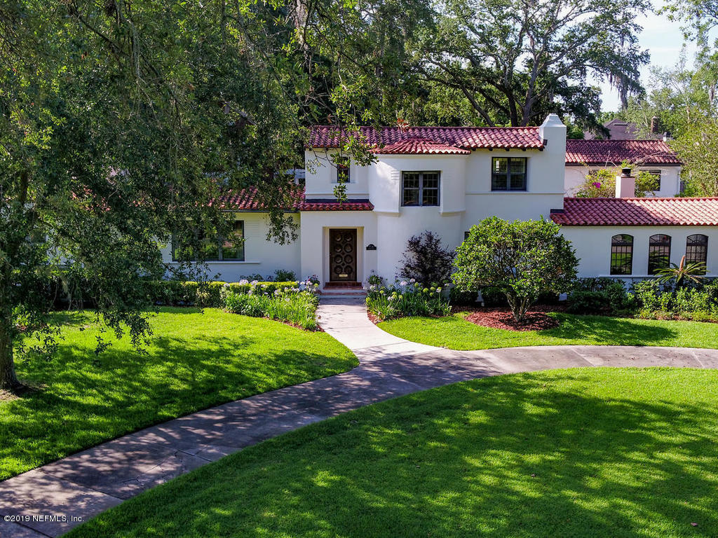1036 Elder Lane Jacksonville, FL 32207 - Photo 71 of 79 a view of a house with a big yard and potted plants
