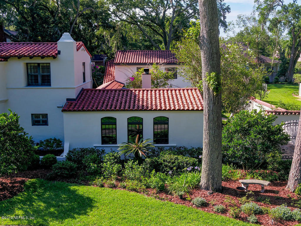 1036 Elder Lane Jacksonville, FL 32207 - Photo 74 of 79 a front view of a house with a garden