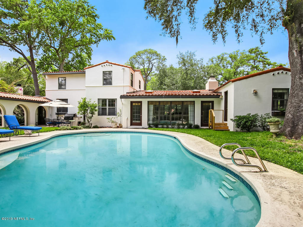 1036 Elder Lane Jacksonville, FL 32207 - Photo 8 of 79 a front view of a house with swimming pool having outdoor seating