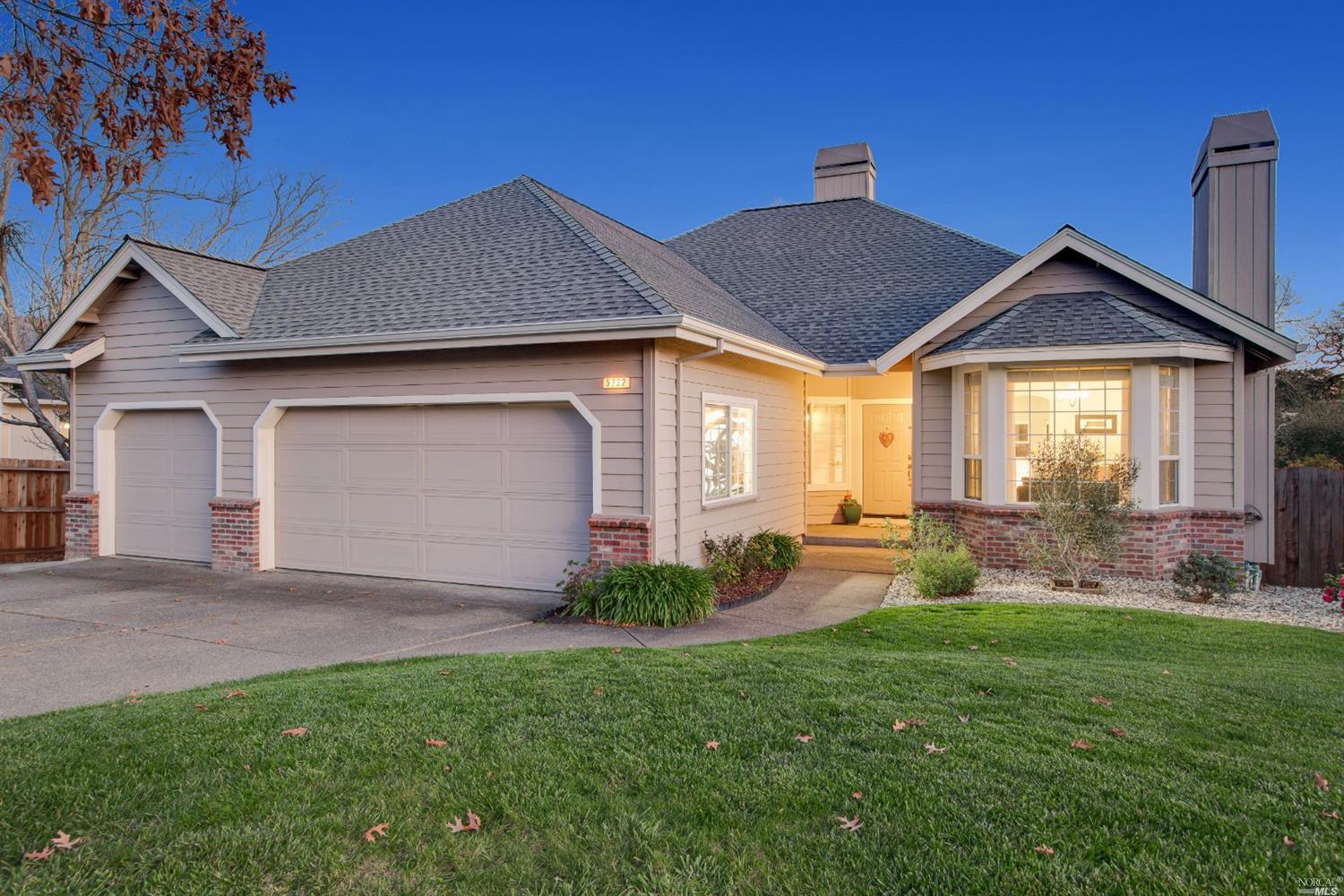 5732 Evening Way Santa Rosa, CA 95409 - Photo 1 of 1 a front view of a house with a yard