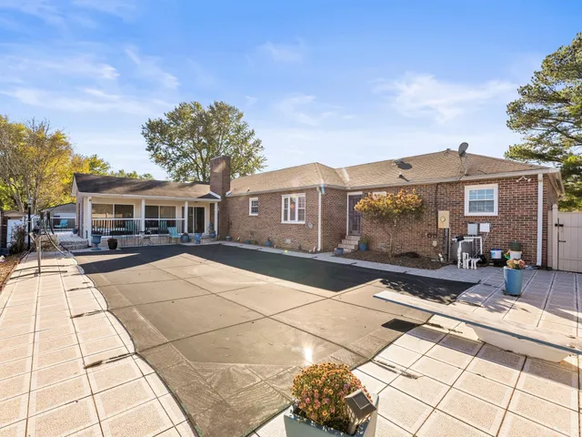 a front view of a building with glass windows