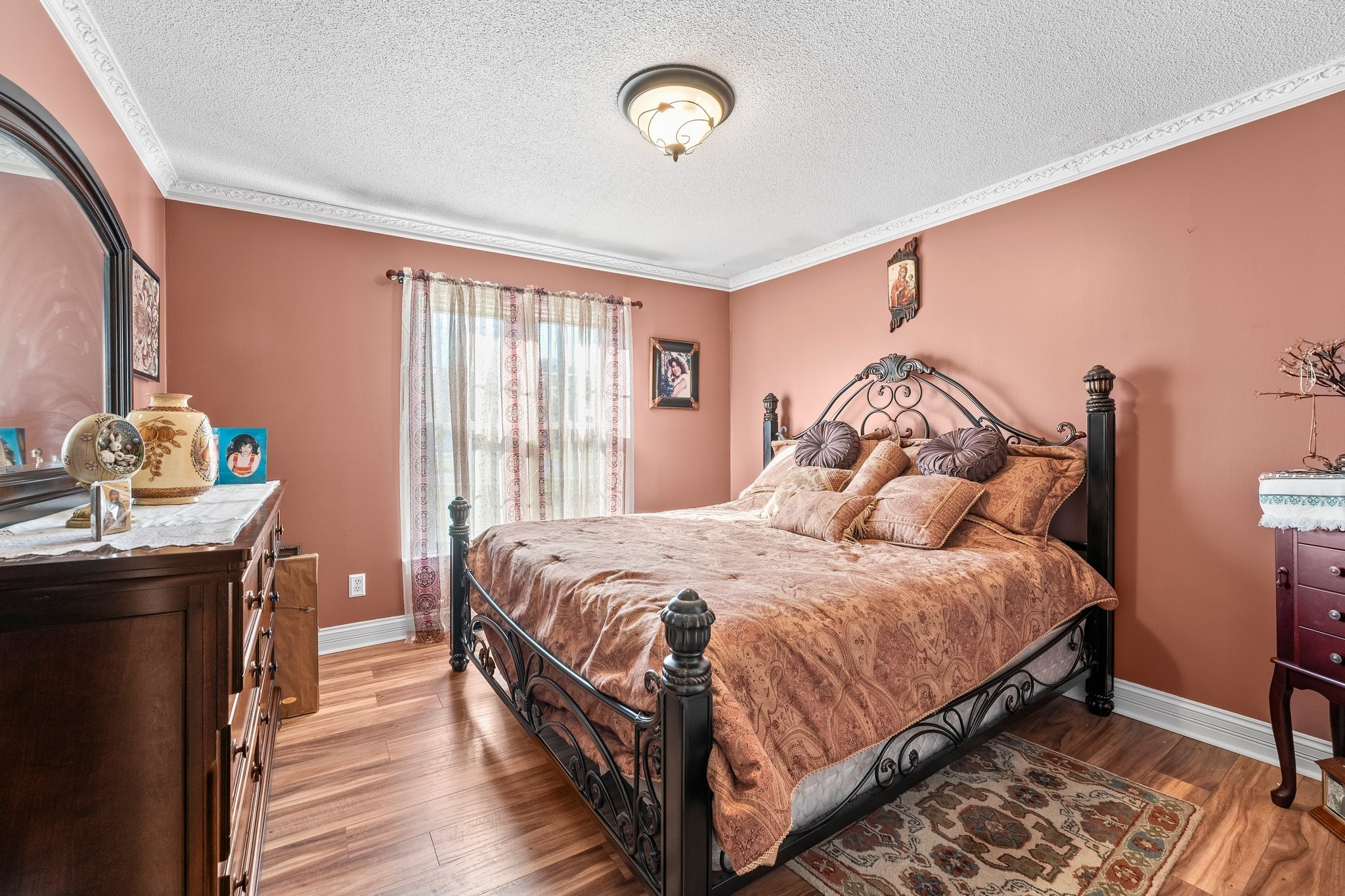 104 12 Oaks Road Tullahoma, TN 37388 - Photo 22 of 41 a bedroom with a bed and wooden floor