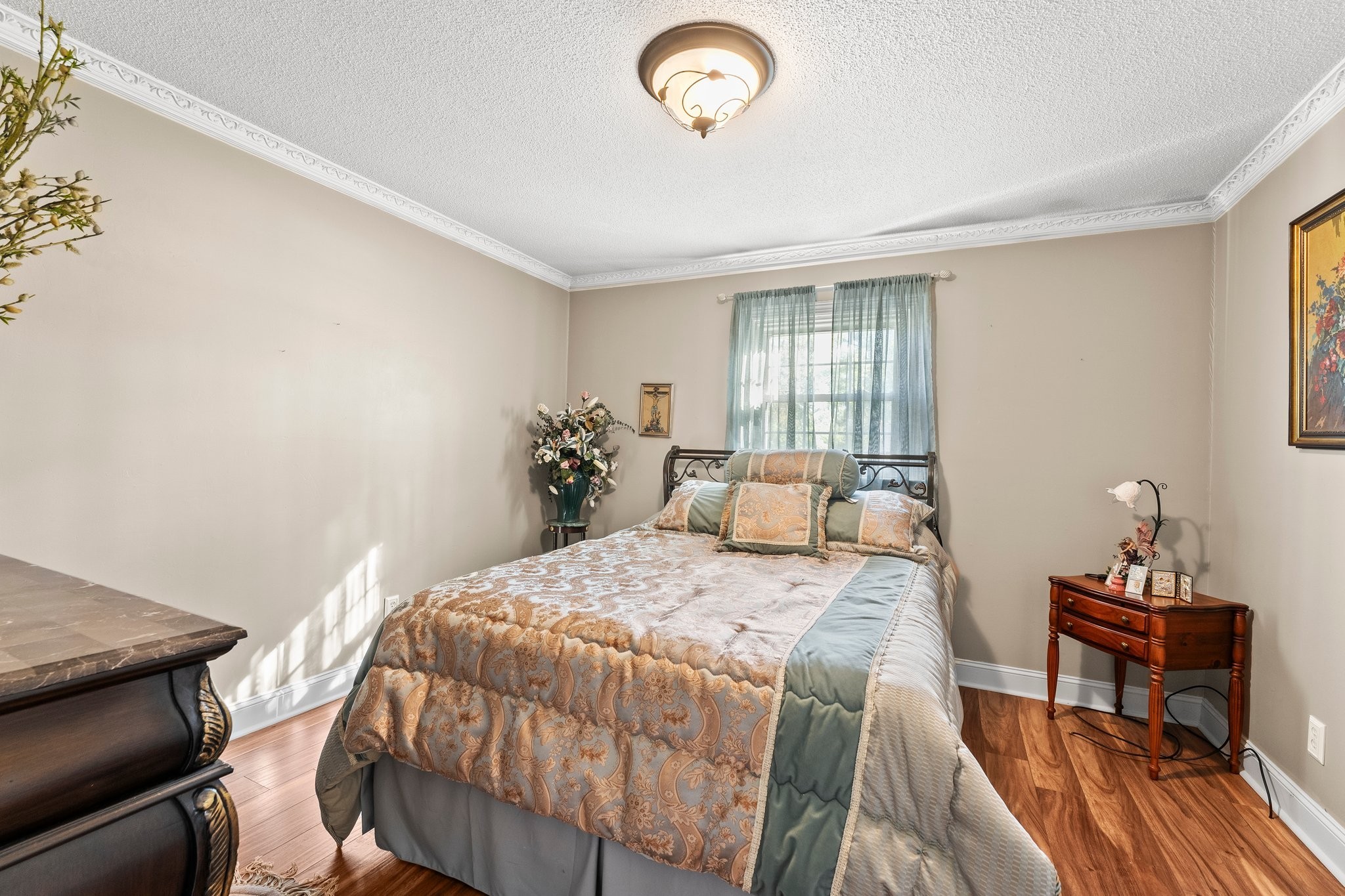 104 12 Oaks Road Tullahoma, TN 37388 - Photo 24 of 41 a bedroom with a bed and a table in it