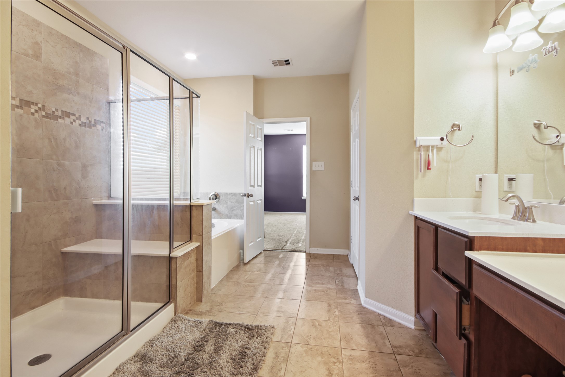 20522 Heath House Drive Porter, TX 77365 - Photo 14 of 16 a bathroom with a sink and a mirror