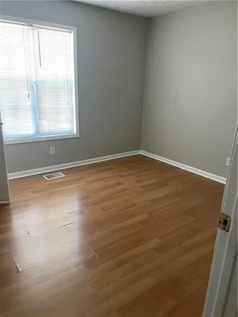 an empty room with a window