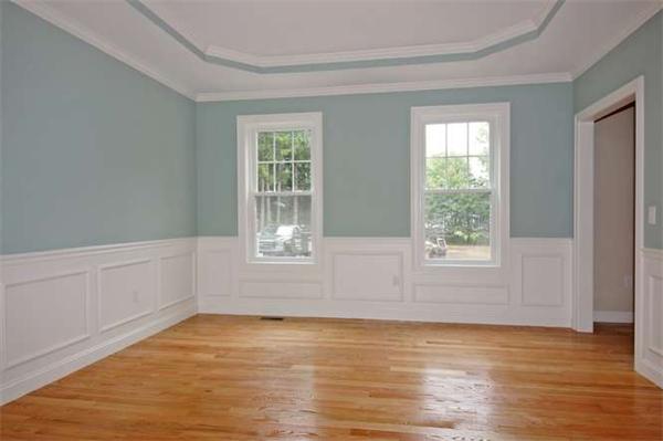 9 Hunt Road Westford, MA 01886 - Photo 3 of 20 a view of an empty room with wooden floor and a window