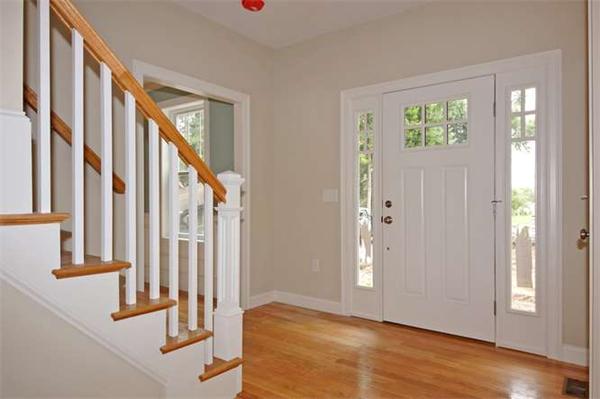 9 Hunt Road Westford, MA 01886 - Photo 5 of 20 a view of an entryway with wooden floor and windows