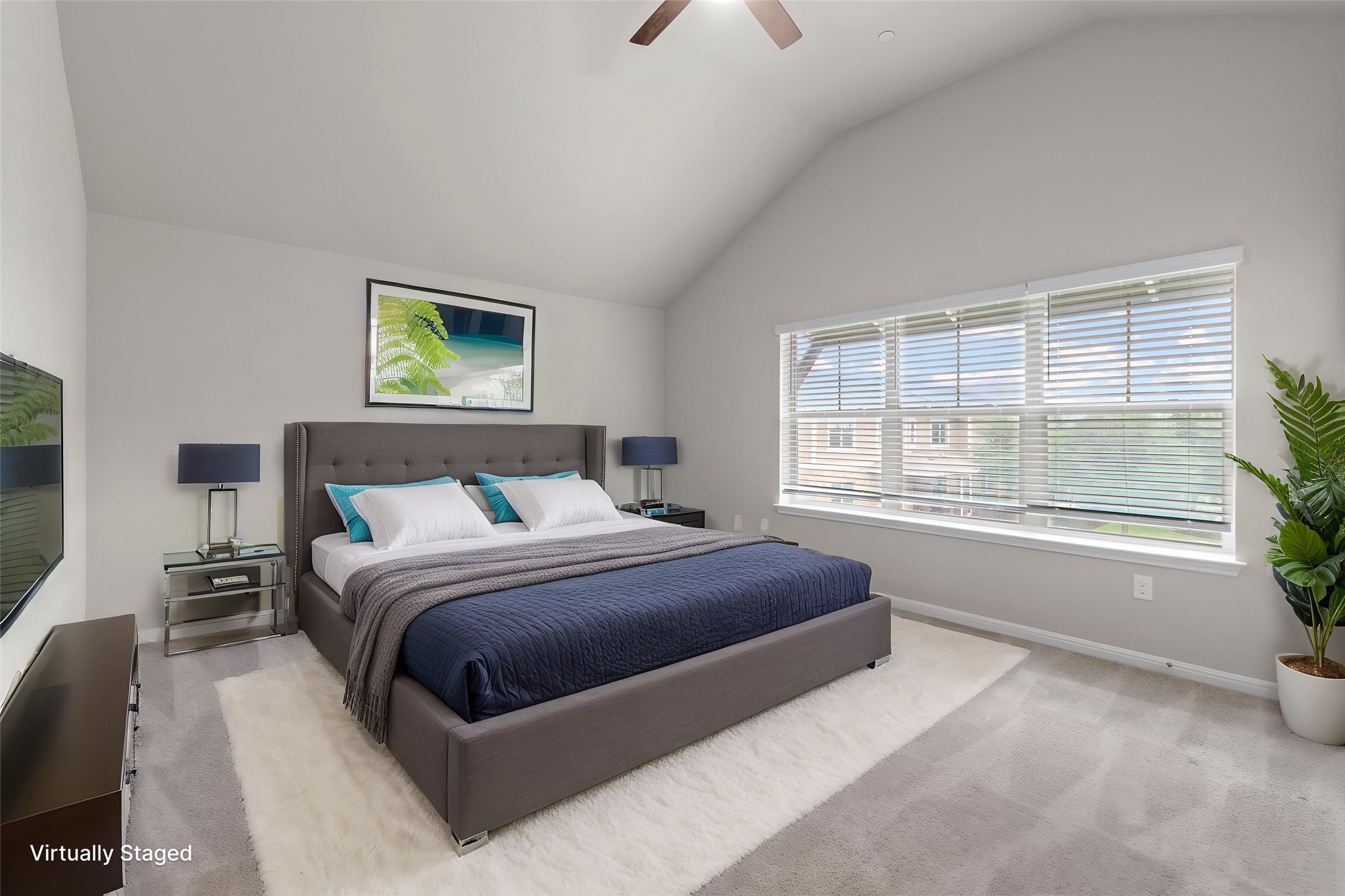 516 East Slaughter Lane, Unit 2001 Austin, TX 78744 - Photo 4 of 31 Spacious room featuring vaulted ceilings, light grey walls, and a large window with blinds