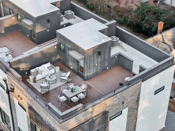 a roof deck with couch