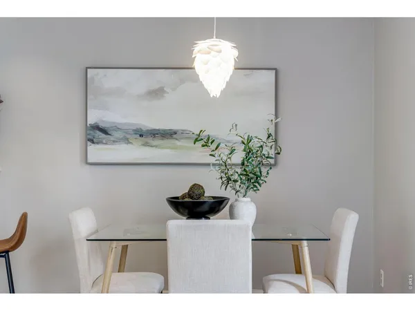 a vase of flowers sitting on a table