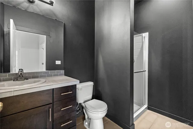 a bathroom with a sink and a toilet