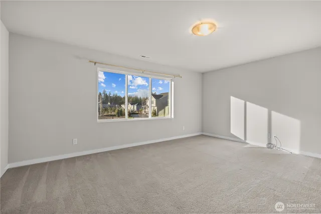 a bathroom with a sink double vanity granite tub and shower