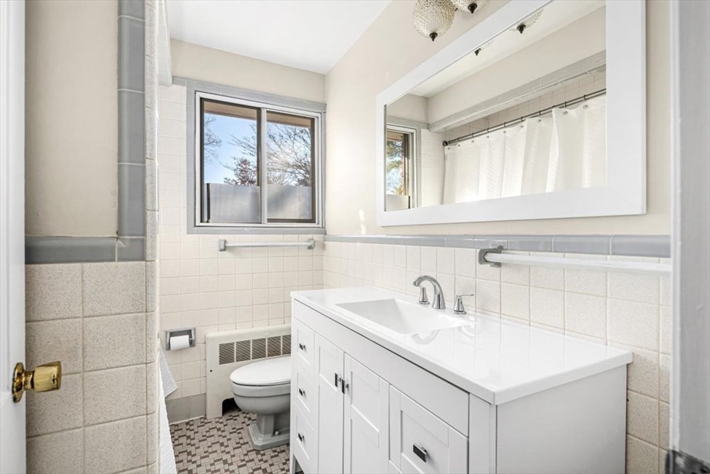 48 Fuller Road Wayland, MA 01778 - Photo 18 of 38 a bathroom with a sink toilet and shower