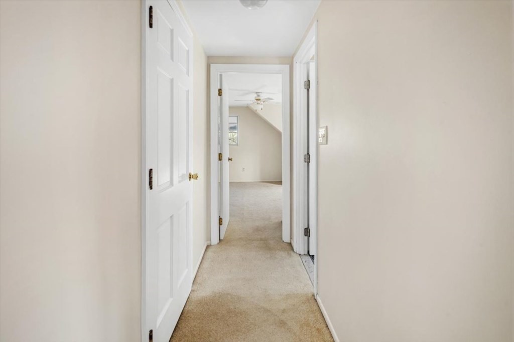 48 Fuller Road Wayland, MA 01778 - Photo 23 of 38 a view of a bathroom from a hallway