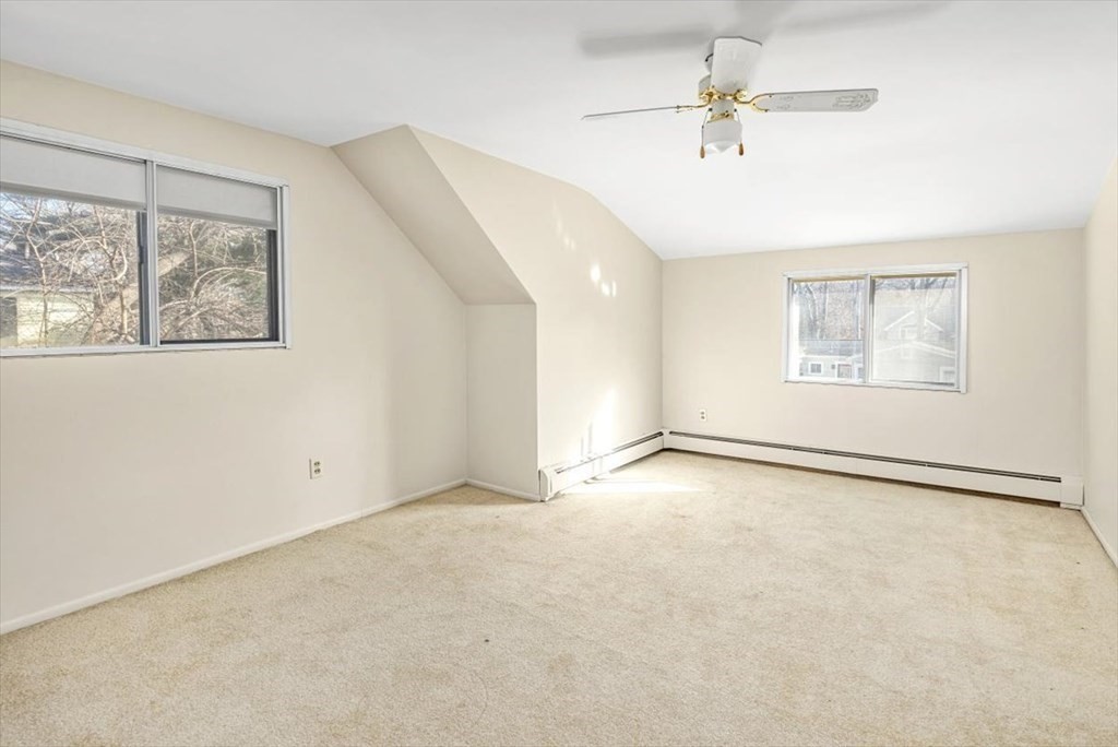 48 Fuller Road Wayland, MA 01778 - Photo 25 of 38 a view of an empty room with a window